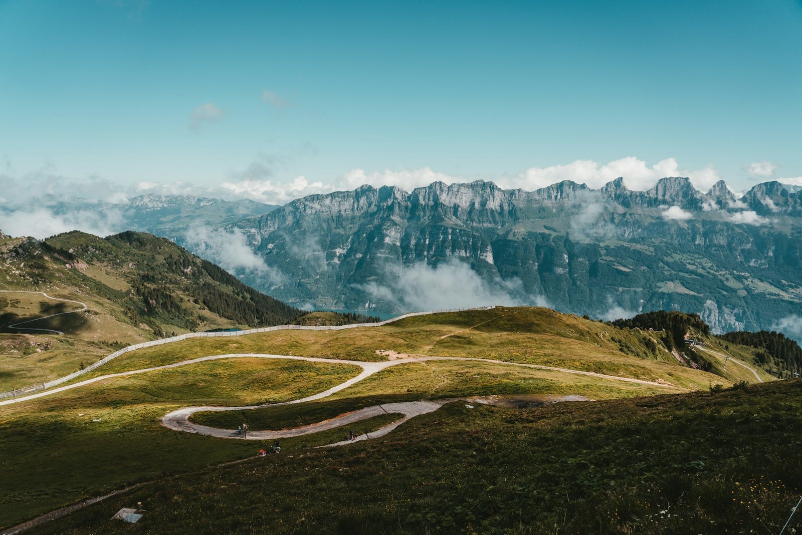 Open road winding through a mountain valley